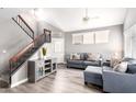 Bright living room with high ceilings, plenty of natural light, and staircase access at 1633 E Lakeside Dr # 48, Gilbert, AZ 85234