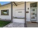 Covered front porch featuring a unique water fountain and welcoming entrance at 1920 N Cavalier Dr, Tempe, AZ 85288