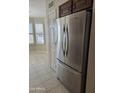 Stainless steel refrigerator featuring french doors, and bright natural light at 3454 E Bellerive Pl, Chandler, AZ 85249
