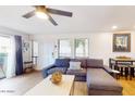 Bright living room featuring a comfortable sectional sofa, and natural light at 3002 N 70Th St # 120, Scottsdale, AZ 85251