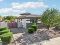 Beautiful home featuring desert landscaping, a brick driveway and gated courtyard entrance at 3371 E Azalea Dr, Chandler, AZ 85286