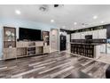 Open floor plan boasts a kitchen with island, and spacious living area at 10112 W Levi Dr, Tolleson, AZ 85353
