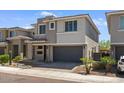 Beautiful home featuring a two-car garage and desert landscaping at 3131 E Tina Dr, Phoenix, AZ 85050