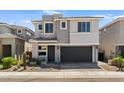Beautiful home featuring a two-car garage and desert landscaping at 3131 E Tina Dr, Phoenix, AZ 85050