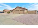 Charming single-story home featuring a well-maintained yard and a spacious two-car garage at 6102 W Shangri La Rd, Glendale, AZ 85304