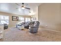 Spacious living room with plush carpeting and an open concept design at 6102 W Shangri La Rd, Glendale, AZ 85304