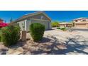 A single story home featuring desert landscaping and a two car garage at 30440 N 42Nd Pl, Cave Creek, AZ 85331