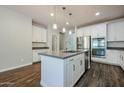 Beautiful kitchen with stainless steel appliances, a center island, and white cabinets at 4336 E Mesquite St, Gilbert, AZ 85296