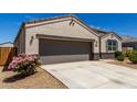 Attractive single-story home with desert landscaping and a spacious driveway at 5146 E Diatomite Dr, San Tan Valley, AZ 85143