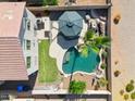 Aerial shot highlighting the property's backyard with pool, green space, and outdoor entertaining areas at 991 W Leah Ln, Gilbert, AZ 85233