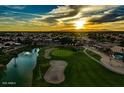 Breathtaking sunset over a golf course community with mountains in the distance at 8542 W Rosemonte Dr, Peoria, AZ 85382