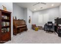 Cozy room with a neutral color palette, a ceiling fan, and plenty of space at 44036 N Hudson Trl, New River, AZ 85087