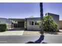 Charming single-story home with covered parking, desert landscaping, and contemporary design at 17200 W Bell Rd # 324, Surprise, AZ 85374