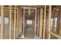 Interior view of new home framing displaying a large open concept design at 32123 N Lone Rancher Way, San Tan Valley, AZ 85140