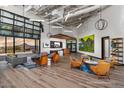 Welcoming community lounge with comfortable seating, televisions, and stylish decor at 32497 N 135Th Dr, Peoria, AZ 85383