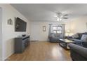 Comfortable living space with a ceiling fan and neutral decor, great for relaxing at 6021 N 31St Ave, Phoenix, AZ 85017