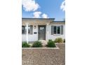Attractive home showcasing a tidy, rock landscape and freshly trimmed bushes at 5328 E Yale St, Phoenix, AZ 85008