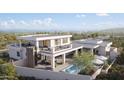 Backyard oasis with pool, covered patio, and rooftop deck overlooking mountain views at 17837 W Estes Way, Goodyear, AZ 85338