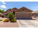 Charming single-story home with a well-maintained desert landscaped front yard and a two-car garage at 3793 E Lexington Ave, Gilbert, AZ 85234