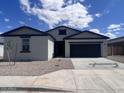 Charming single-story home featuring a neutral color palette and a two-car garage, offering comfort and curb appeal at 47253 W Pecan Woods --, Maricopa, AZ 85139