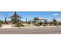 Community park featuring new landscaping, walking paths and covered playground for residents at 4939 S 106Th Ave, Tolleson, AZ 85353