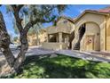 Exterior elevation featuring a covered entry and stairs to apartments in a complex with a grassy yard at 1126 W Elliot Rd # 2040, Chandler, AZ 85224