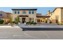 Inviting home with desert landscaping, porte-cochère, and well-manicured front yard at 22406 N 36Th Way, Phoenix, AZ 85050