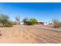 Single-story home with a large yard and a driveway at 3747 S Mammoth Dr, Casa Grande, AZ 85193