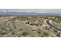 Expansive aerial view of home featuring a detached garage and desert landscaping at 14118 E Rancho Del Oro Ct, Scottsdale, AZ 85262