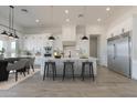 Bright, spacious kitchen with an island, modern appliances, and ample counter space at 1845 N 103Rd St, Mesa, AZ 85207