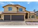 Charming two-story home with a tile roof, arched windows, and a well-manicured front yard at 20713 N 56Th Ave, Glendale, AZ 85308
