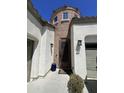 Unique front door with architectural detail set in a brick alcove at 514 E Pearce Rd, Phoenix, AZ 85042