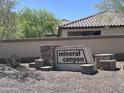 Mineral Canyon community sign featuring decorative stone and block at 514 E Pearce Rd, Phoenix, AZ 85042