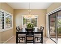 Dining room featuring tile floors, natural light, and a neutral color palette at 13850 N Mirage Heights Ct # 201, Fountain Hills, AZ 85268