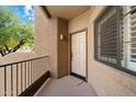 A welcoming front door, with covered porch, that offers curb appeal at 13850 N Mirage Heights Ct # 201, Fountain Hills, AZ 85268