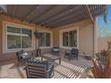 Stylish covered patio with comfortable seating and a cozy atmosphere, perfect for relaxation at 2784 E Honeysuckle Pl, Chandler, AZ 85286