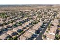 Neighborhood aerial showcasing residential homes and planned community layout in a desert setting at 4626 N 111Th Ln, Phoenix, AZ 85037