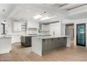 Modern kitchen with double islands, sleek cabinetry, and stainless steel appliances and lots of light at 5838 E Berneil Ln, Paradise Valley, AZ 85253