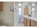 Bright bathroom featuring a shower and vanity with modern fixtures and tasteful decor at 7750 E Broadway Rd # 535, Mesa, AZ 85208