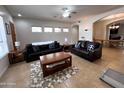 Cozy living room with tile flooring at 2427 W Desert Hills Estate Dr, Phoenix, AZ 85086