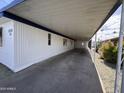 Spacious carport of a mobile home with ample covered parking at 303 S Recker Rd # 50, Mesa, AZ 85206