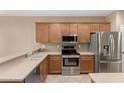 Well-equipped kitchen featuring stainless steel appliances, and ample counter space at 3239 S Tatum Ln, Gilbert, AZ 85297