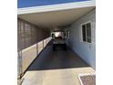 Spacious carport featuring a golf cart, providing convenient parking and protection from the elements at 3330 E Main St # 256, Mesa, AZ 85213