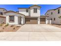 Beautiful two-story home with two-car garage, wide driveway, and desert landscaping at 5016 W Brown St, Glendale, AZ 85302
