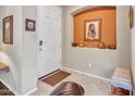 Welcoming entryway with tiled floors, decorative niches, and neutral paint at 15216 W Westview Dr, Goodyear, AZ 85395