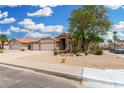 Lovely single-story home with a two-car garage and xeriscaped front yard at 19029 N 36Th St, Phoenix, AZ 85050
