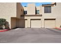 Image of a home's garages and covered parking with desert landscape and rock details at 3441 N 31St St # 118, Phoenix, AZ 85016