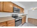 Well-equipped kitchen featuring stainless steel appliances and granite countertops at 8787 E Mountain View Rd # 1087, Scottsdale, AZ 85258