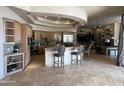 Spacious kitchen boasts a large island, high-end appliances, and seamless flow into the living area at 9267 E Rimrock Dr, Scottsdale, AZ 85255