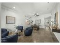 Bright and airy living room featuring modern furniture and neutral decor, ideal for relaxing or entertaining at 2226 W Periwinkle Way, Chandler, AZ 85248